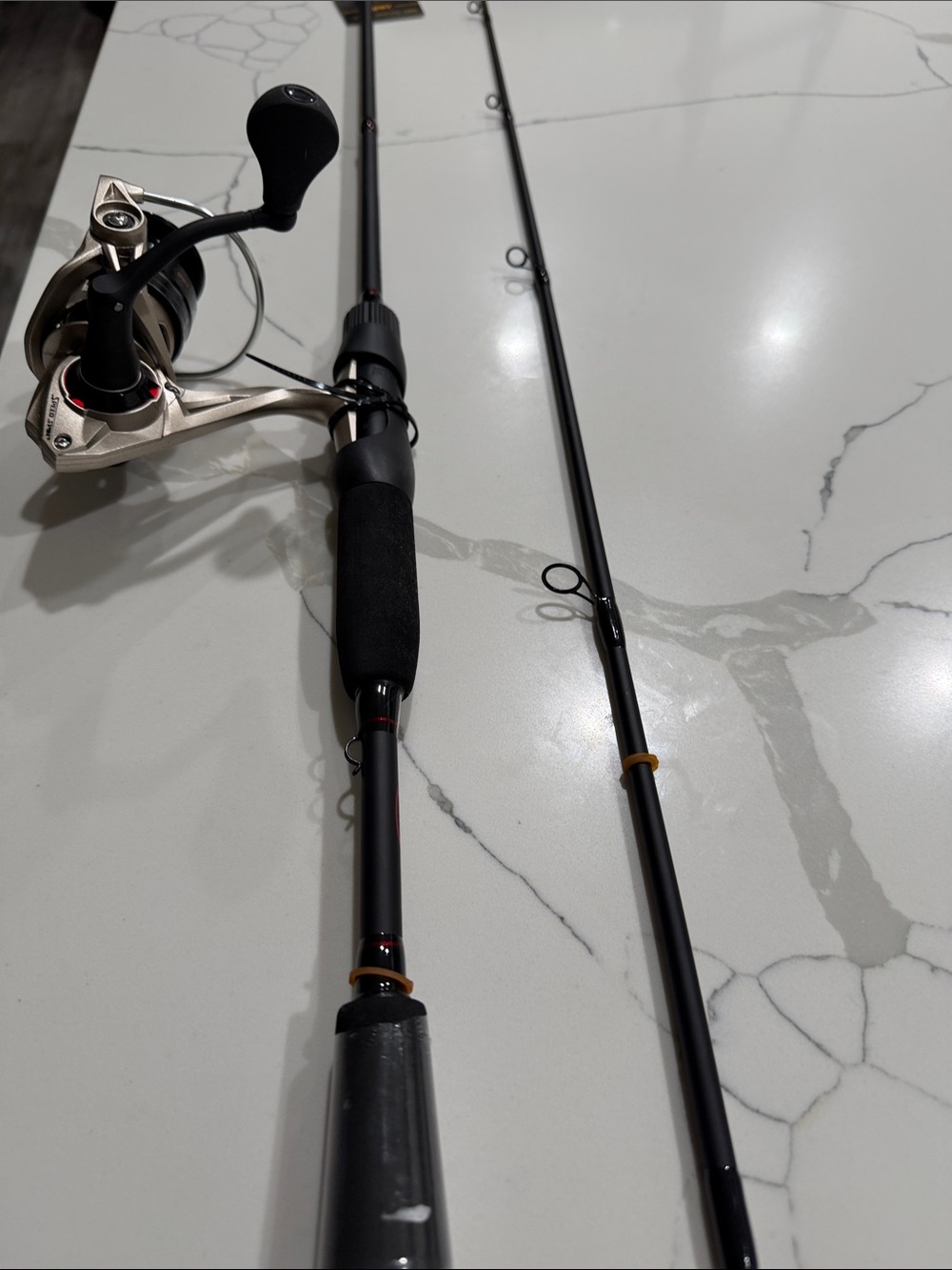 Black Spinning Fishing Rod and Reel Combo - Lightweight Performance
